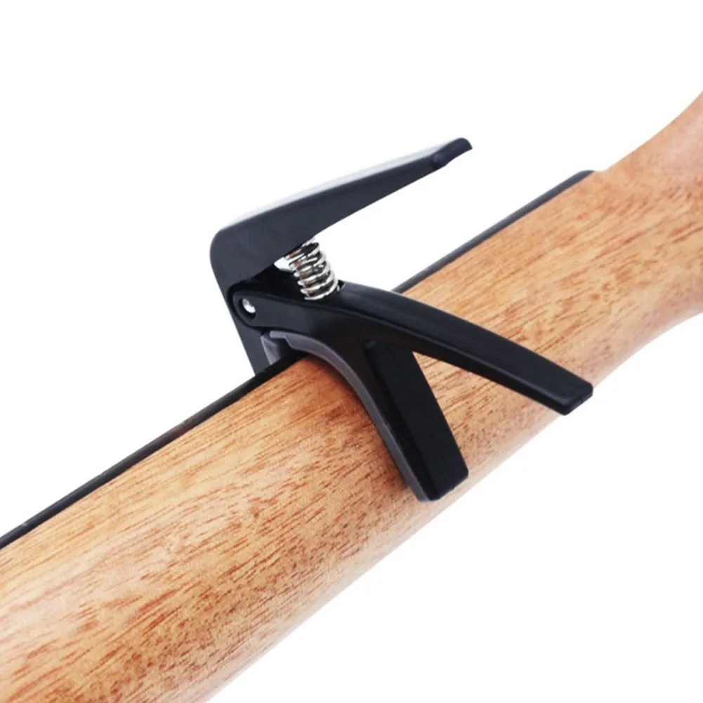 Pratico Durevole Di Alta Qualità Caldo Nuovo Bello Portatile Ukulele Capo Hawaii Chitarra Cambio Rapido Morsetto Tuning 4 Corde