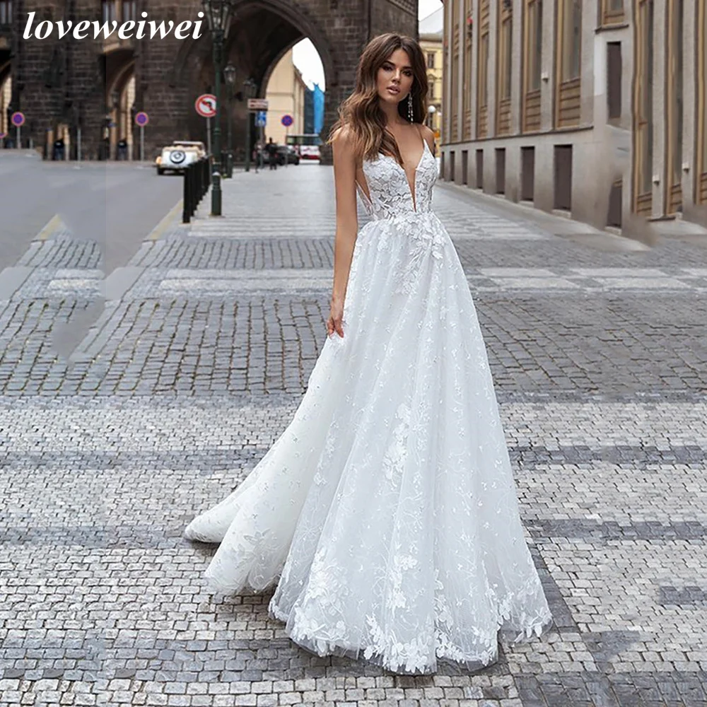 

Loveweiwei Boho White Wedding Dress A-Line V-Neck Appliques Spagetti Straps Bridal Gowns Dubai Backless Brides Dress Custom Made