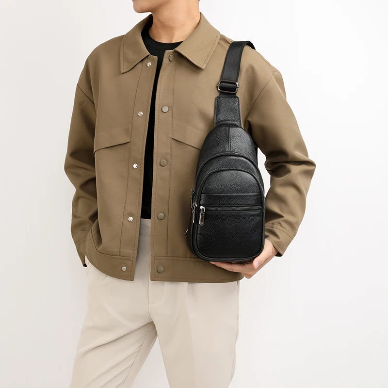 Stylish genuine leather sling bag for men with multiple compartments, ideal for everyday carry or travel