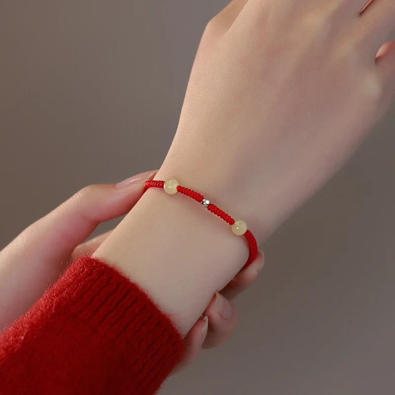 

Chinese Year of the Rabbit Bracelet Female 925 Sterling Silver Hetian Jade Ashore Good Luck Hand-woven Red Hand Rope
