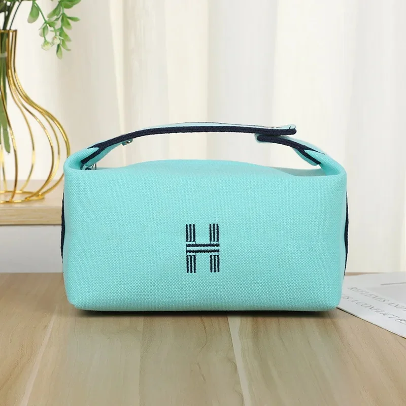 Blue-H canvas cosmetic bag