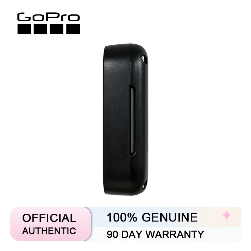 Gros plan sur la télécommande sans fil pour GoPro affichant l'écran LCD et les boutons de contrôle, sangle poignet détachée