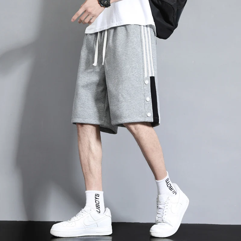 Fashion Spliced Button Striped Casual Shorts Men's Clothing 2024 Summer New Loose Elastic High Waist All-match Knee Shorts