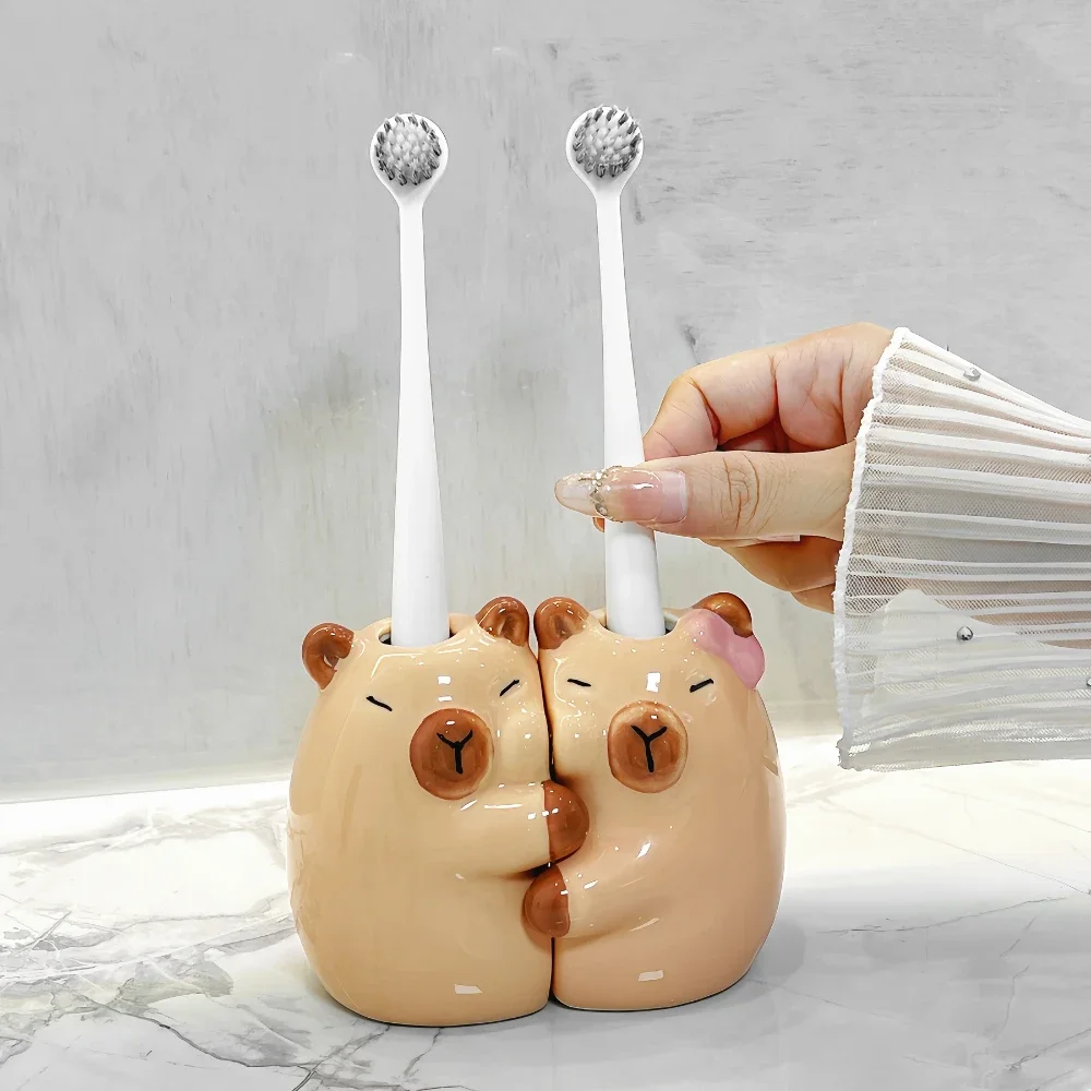 A cute Capibala manual toothbrush storage base bracket suitable for fashionable couples bathroom ceramic bow toothbrush holder