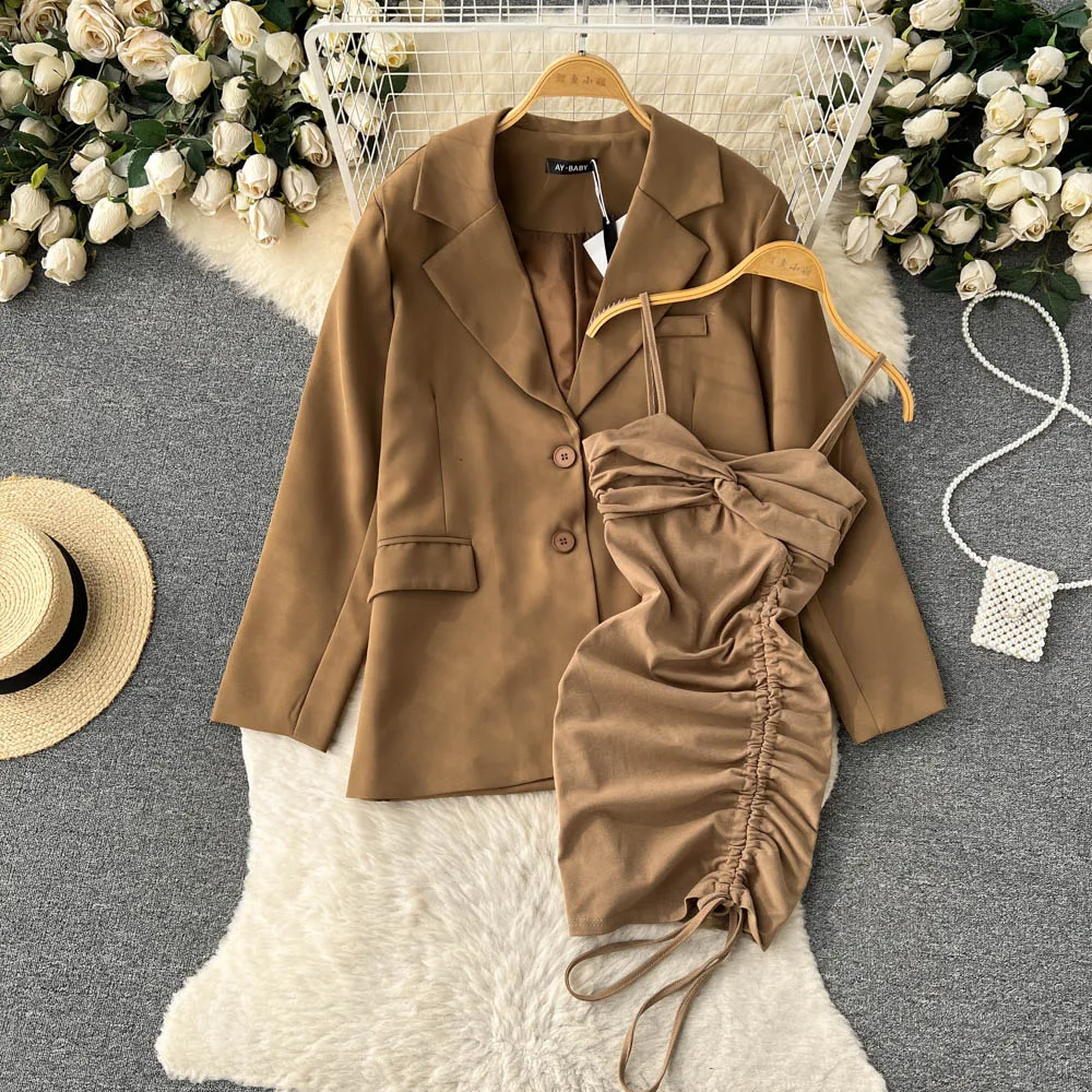 

Spring New Long-sleeved Lapel Suit Jacket Women + Pure Desire Wind Pleated Lace-up Sling Dress Two-piece Suit