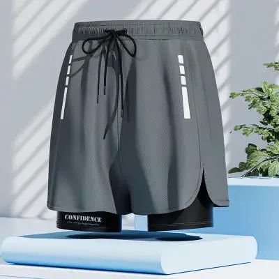 thumbnail image 1 of Bañadores de estilo americano para hombre, pantalones deportivos para correr, ropa interior, pantalones cortos informales de baloncesto antiexposición para entrenamiento de ilusión de dos piezas, 1 of 5
