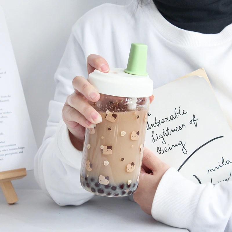 https://ae01.alicdn.com/kf/S609938df9ad64c6f8664dc57340cc8d3T/Kawaii-Cat-Bubble-Tea-Glass-Water-Bottle-With-Straw-PU-Sleeve-Cute-Boba-Coffee-Milk-Cups.jpg