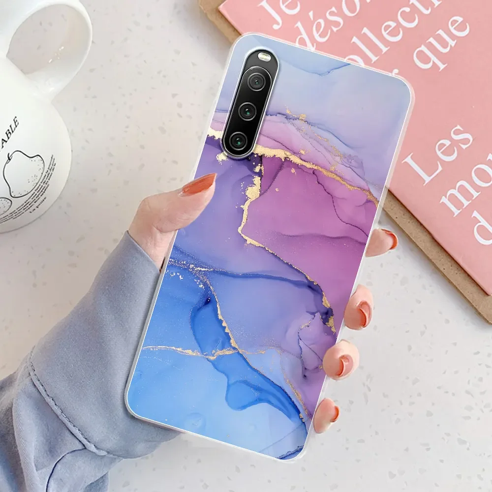 Movilshop Custodia antiurto per Sony Xperia 10 IV Design Musica [Icone Musica Arancione e Blu ] Angolo Rinforzato Silicone 1,5 mm di Spessore Flessibile Trasparente Bumper Gel TPU