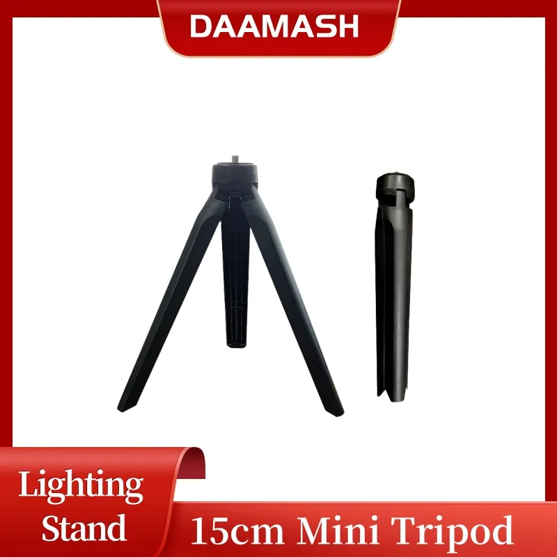 Mini trépied cardan 15cm de côté montrant sa structure pliable, support de table compact.