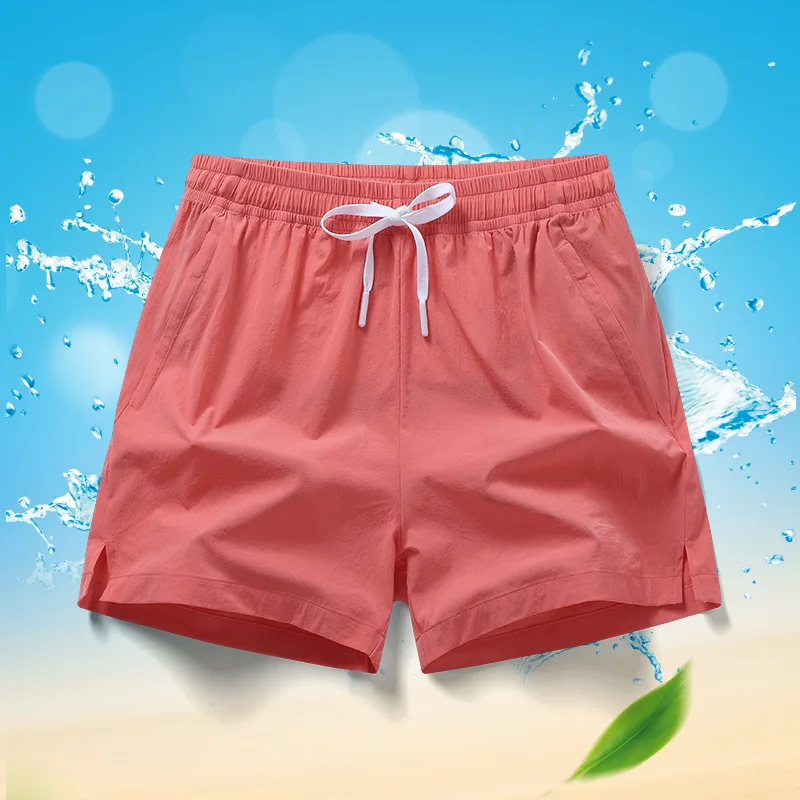 Summer New Solid Color Fashion Elastic Waist Shorts Man High Street Casual Pocket Patchwork Drawstring Breathable Sweat Pants