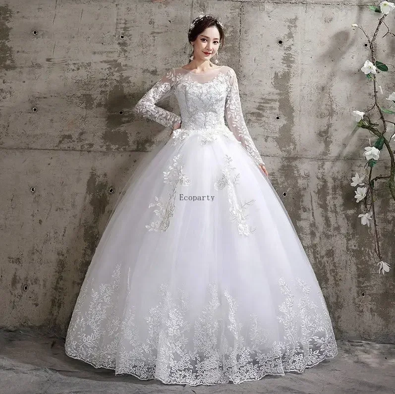 Robe de Mariée Princesse Blanche Dentelle Manches Longues Élégante
