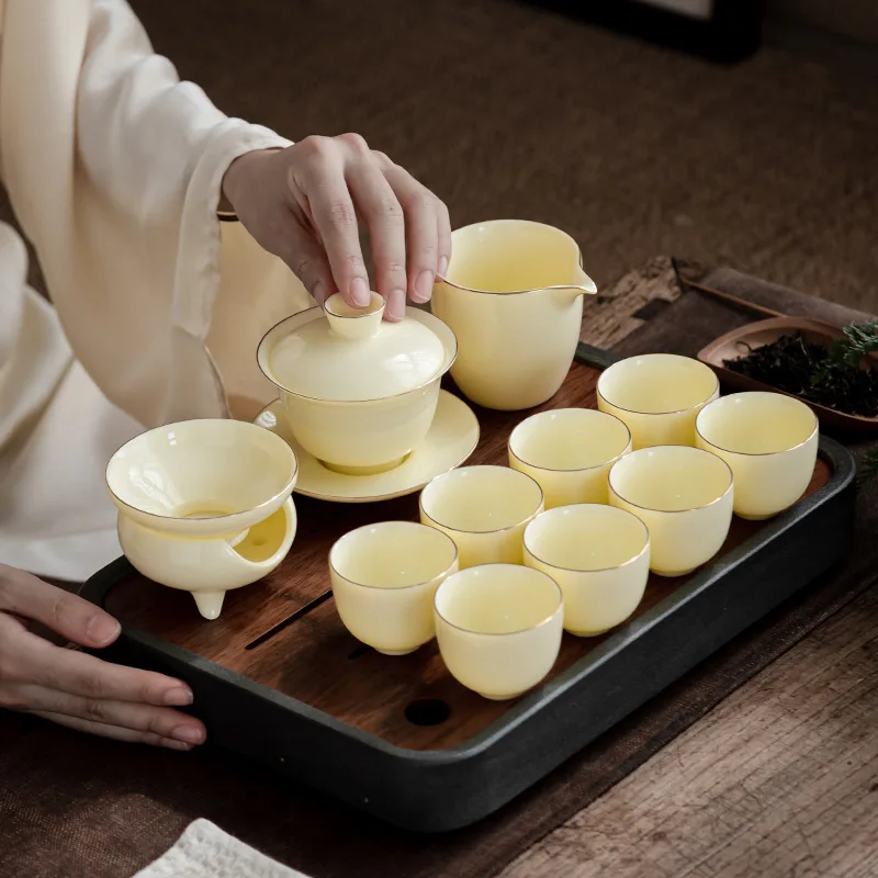 

Chinese Kung Fu Tea Set 12 Pieces Set Tea Gaiwan Pitcher Teacups and Filter Yellow Jade Ceramic Upscale Simple Household Teaware