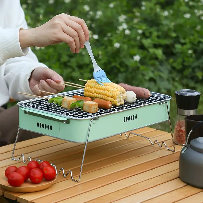 https://ae01.alicdn.com/kf/S60f1f9eae3464127becdae4ae528a7ffy/Small-Portable-Foldable-BBQ-Grills-Patio-Barbecue-Charcoal-Grill-Stove-Stainless-Steel-Outdoor-Camping-Picnic.jpg