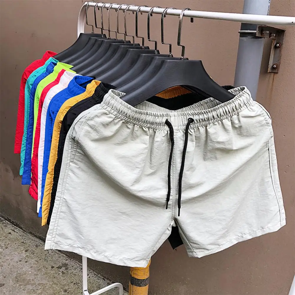 

Summer Men Swimwear Beach Shorts Solid Color Elastic Waist Quick-drying Breathable Shorts Trunks Swimming Pants Loose Male Cargo