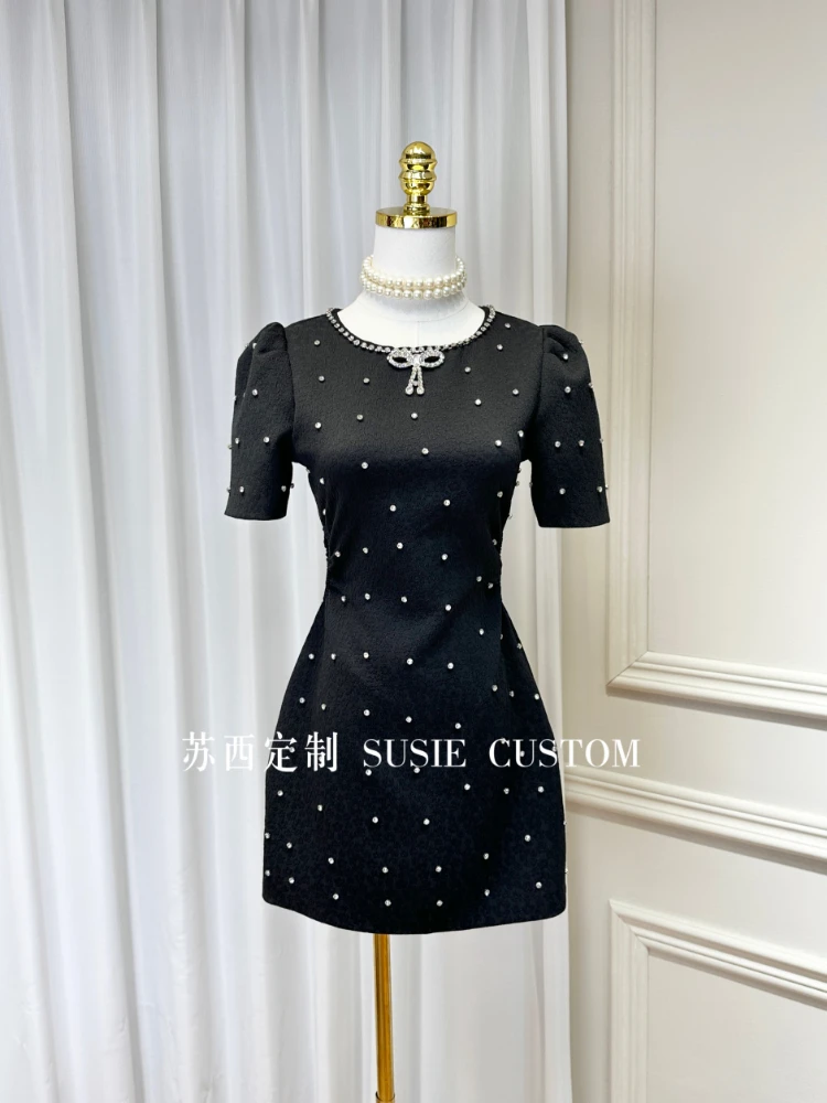 

French Heavy Industry Elegant Rhinestone Bow Round Neck Puff Sleeve Hollow Out High Waist A-Line Short Dress Female Summer 2024