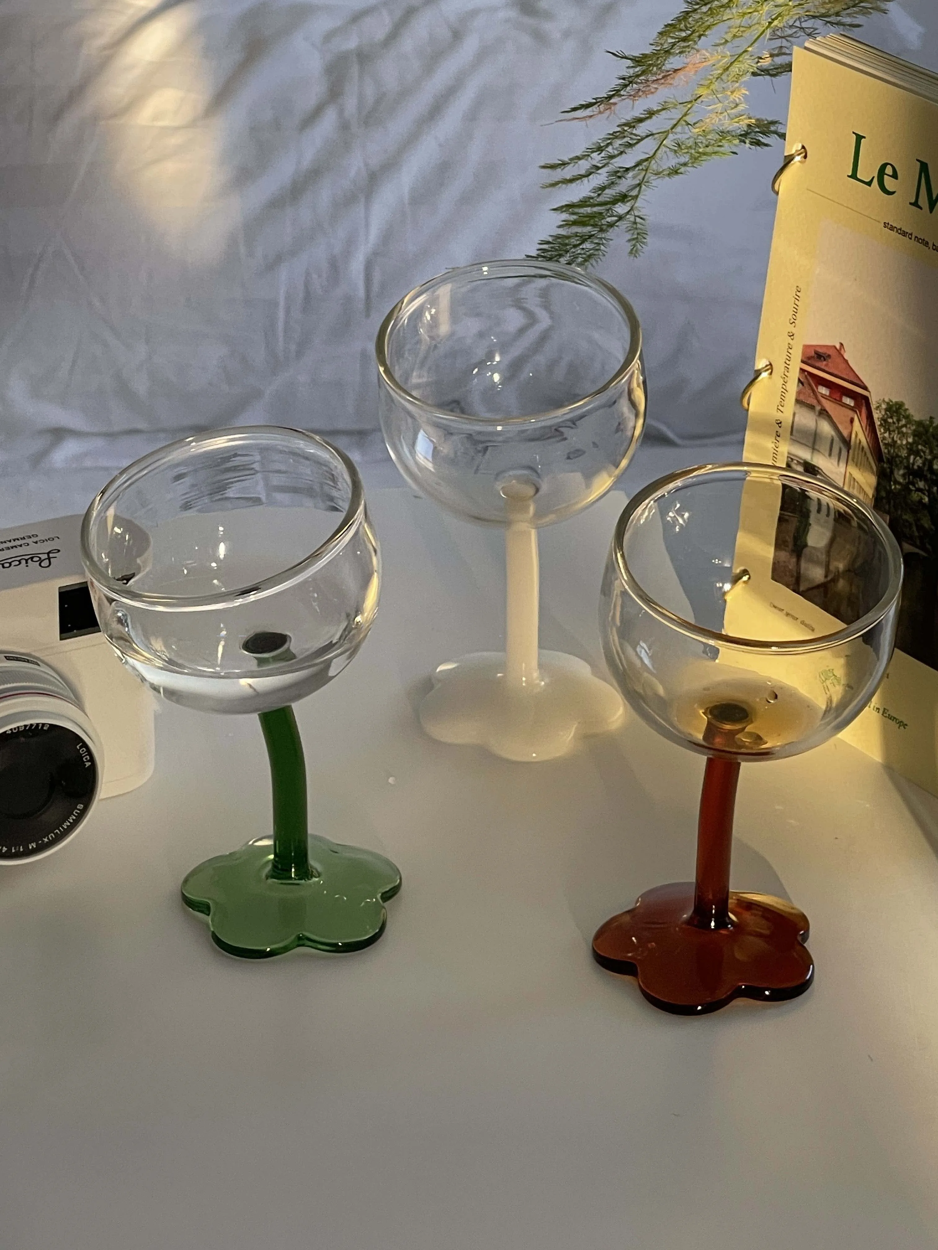 https://ae01.alicdn.com/kf/S610245e91b644d19bb8aef492392a18aM/Homemade-Vintage-Wine-Cup-Lovely-Flower-Water-Cup-Crooked-Handle-Glass-High-Foot-Glass-Creative-Champagne.jpg