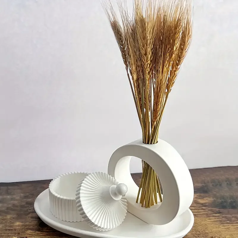 Round test tube vase mold with striped jar and tray silicone molds.