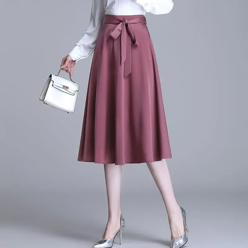 2025 Autunno New Office Lady Semplicità Allacciatura a vita alta Gonna a trapezio Donna Moda coreana Arco Gonna a pieghe tinta unita Donna 4