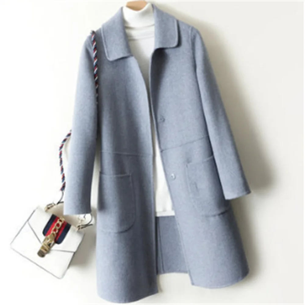 

Женское длинное шерстяное пальто с кукольным воротником