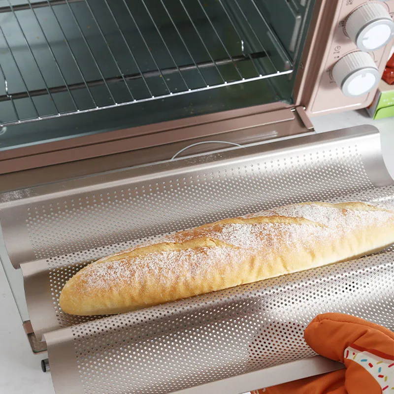 https://ae01.alicdn.com/kf/S61199605e7ac43cf915fc71a95450720d/2-4-Slot-Cake-Mold-Baking-Supplies-Bread-Pan-Non-Stick-Perforated-Baguette-Pan-Loaf-Bakeware.jpg