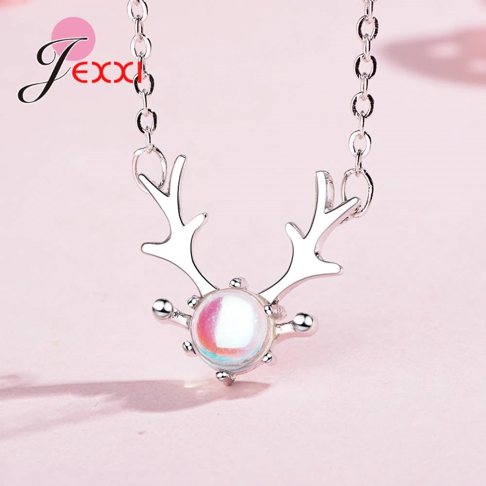 Sterling silver deer antler necklace featuring a central iridescent moonstone sphere.