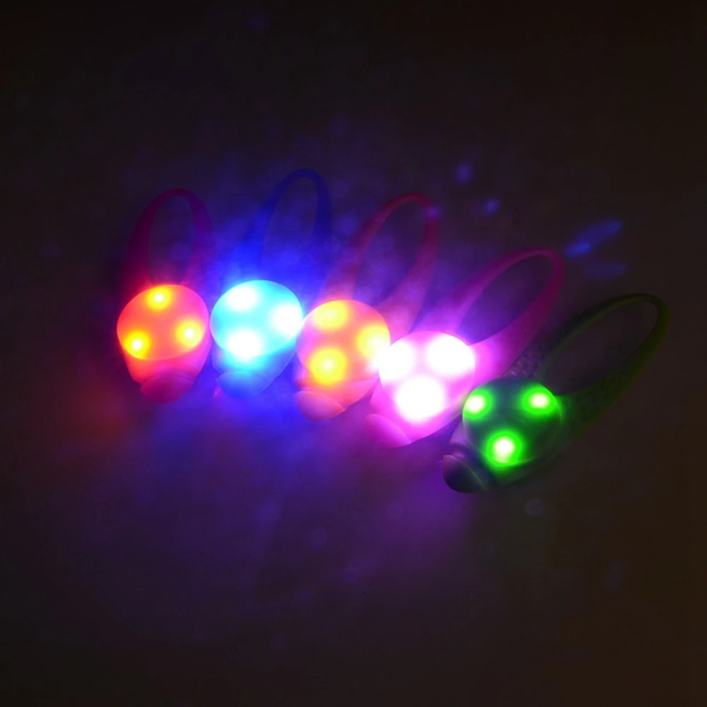 A group of colorful dog led pendant lights providing safer walks at night.