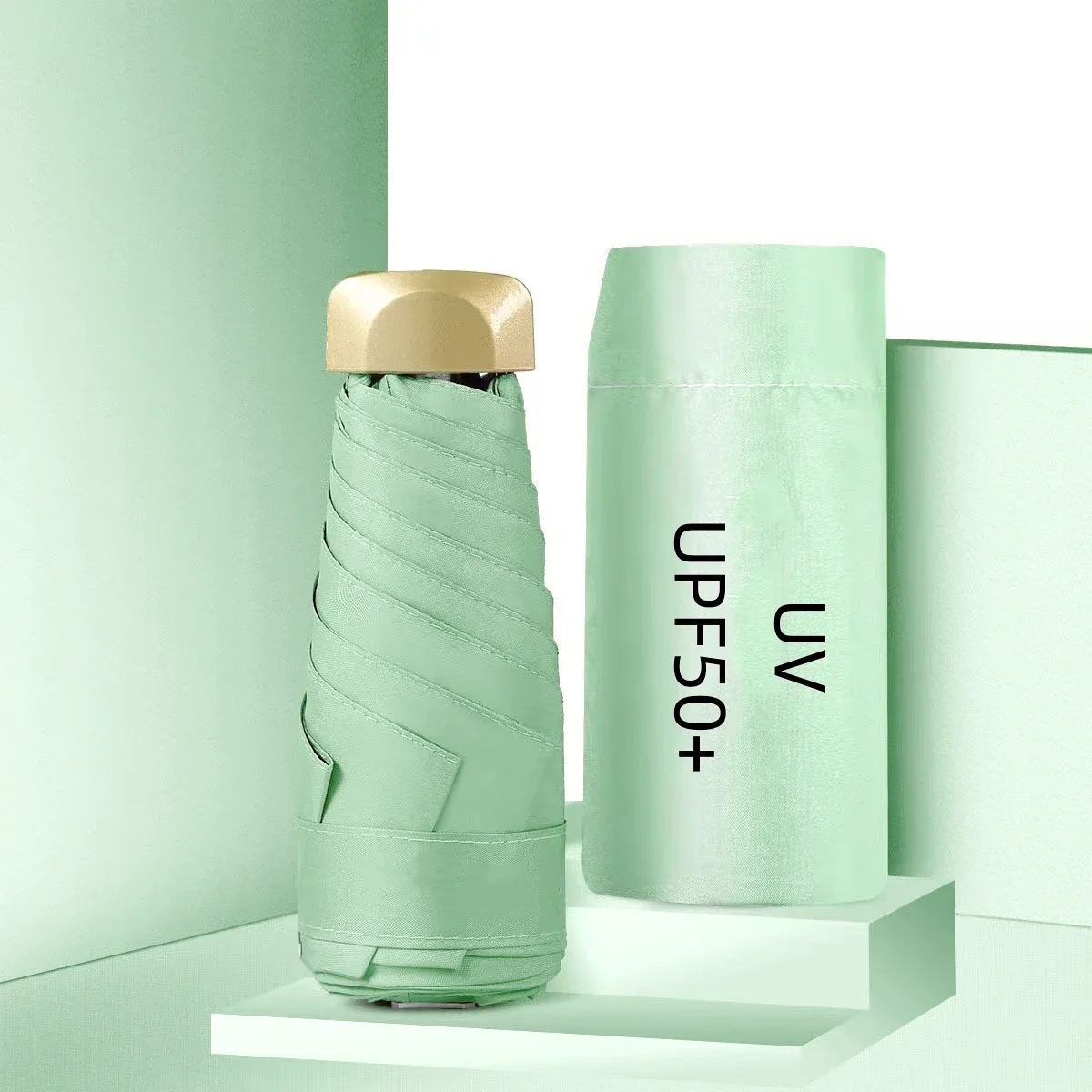 Парасолька для обох сонячних дощових днів поза. Міні-портативна парасолька із захистом від ультрафіолетового випромінювання, що складається, компактна капсула, UPF50 + дорожня парасолька