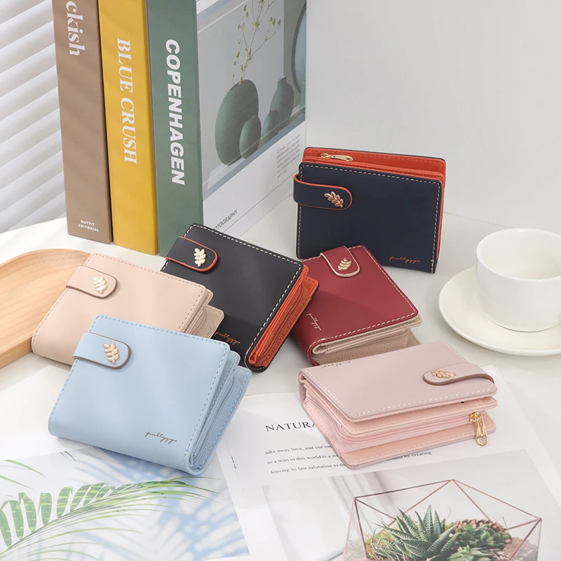 2025 spring new women's short wallet South Korea small fresh solid color buckle folding can expand the student multi-card ticket 2