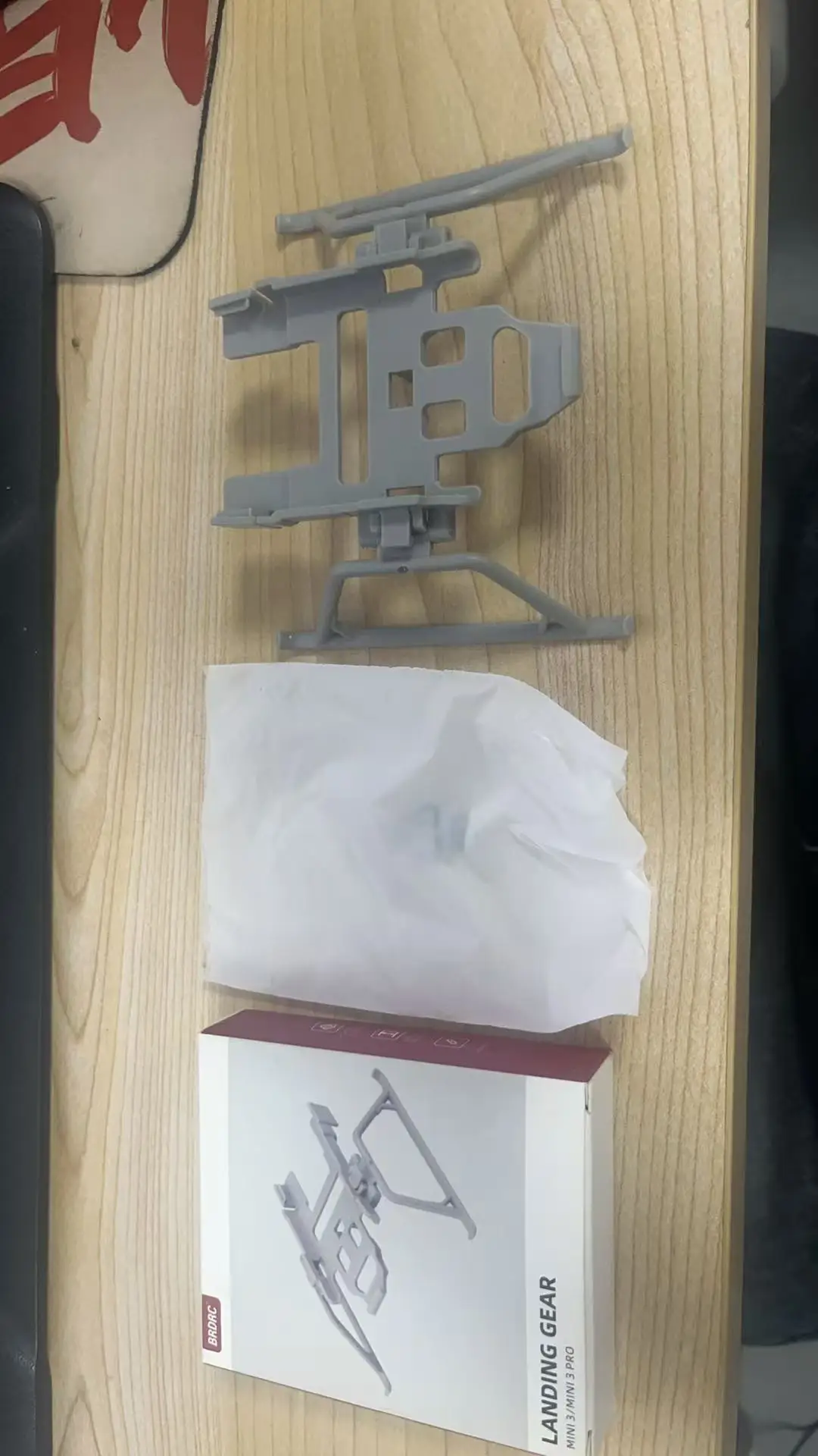Train d'atterrissage pliable pour DJI Mini 3 et Mini 3 Pro, plié pour le transport.