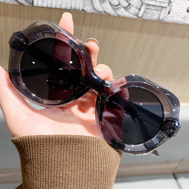 1 par de gafas de sol para mujer, montura redonda moderna, diseño elegante y único, favorecedoras para el rostro, estilo urbano a la moda, adecuadas para 2