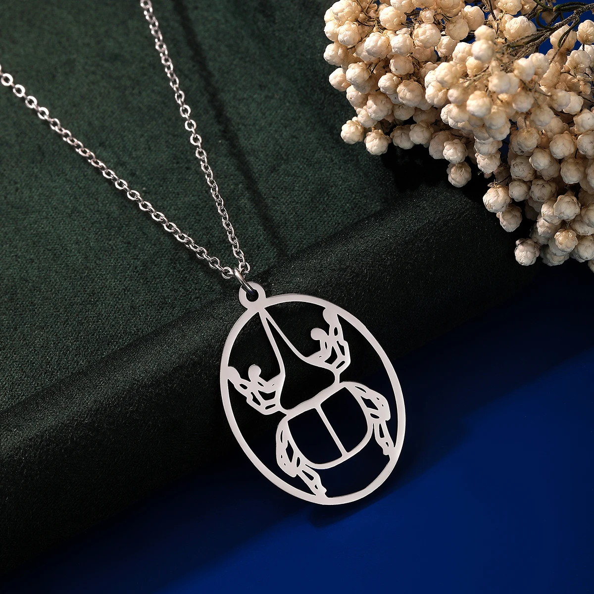 Chandler Stainless Steel Hercules Beetle Laser Cut Pendant Necklace Raw Brass Oval Insect Charms for Men and Women 2