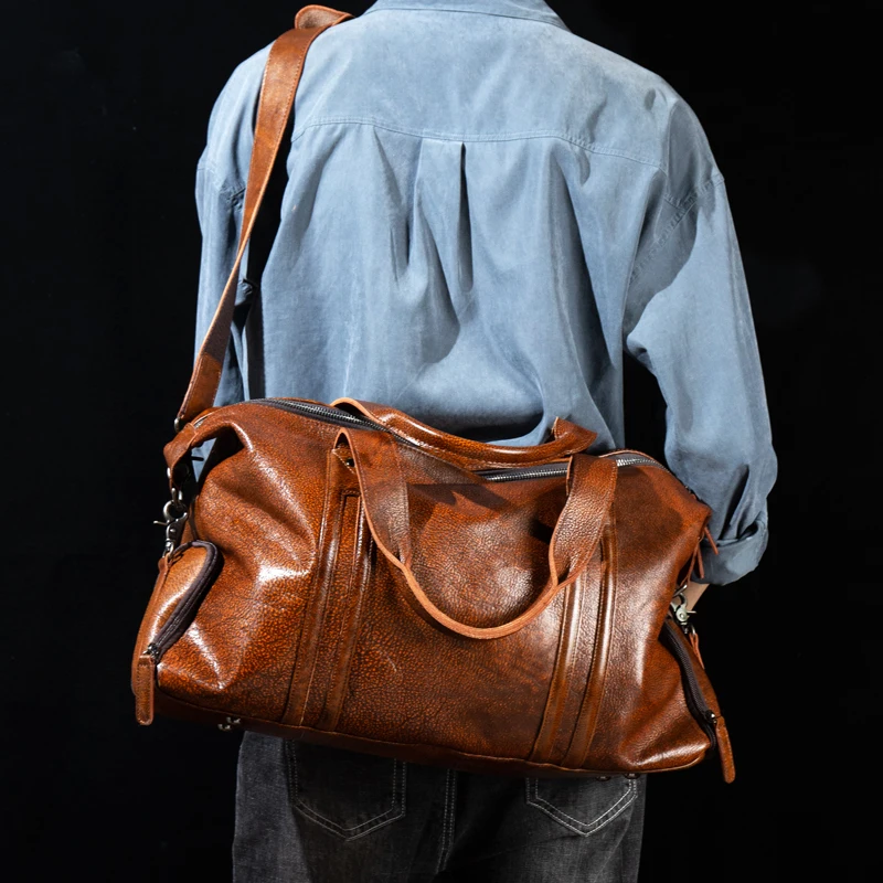 Leather short-distance travel bag men's hand-held large-capacity travel bag top layer leather shoulder