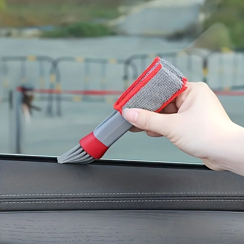 Cleaning car air vent using the brush