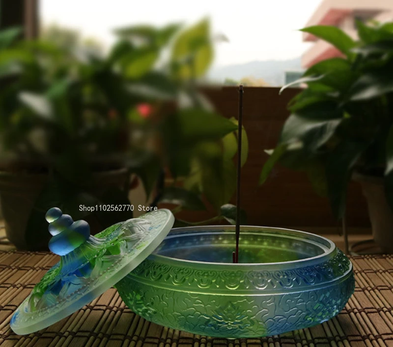 green ancient glass incense burner with incense