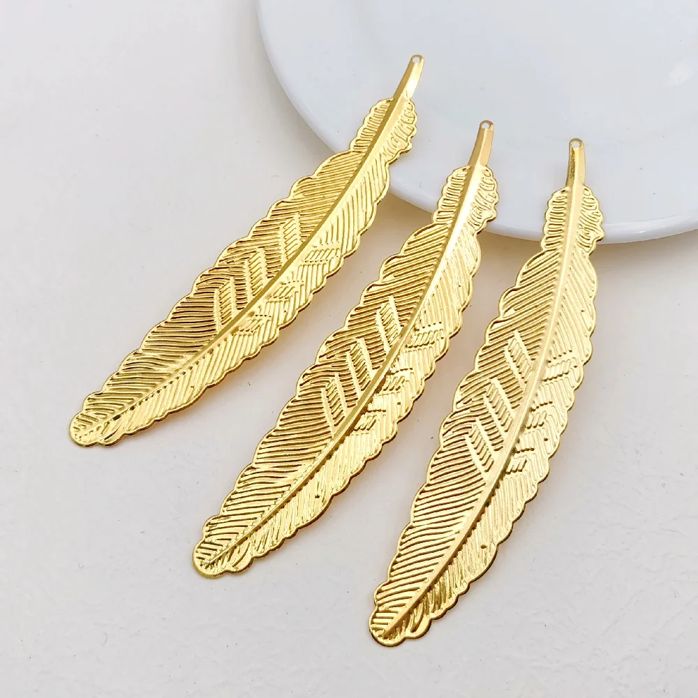 

10/100 pcs 114x23mm Gold color Creative Metal Filigree Flowers Slice Big Feather Bookmark Charms Pendant For Jewelry Making