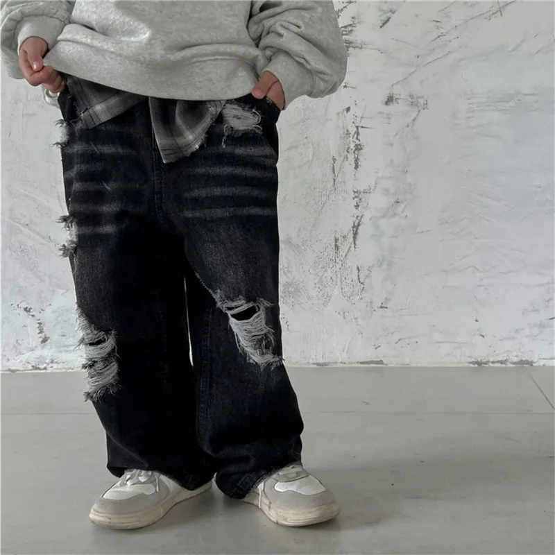 

Детские джинсовые брюки, красивые крутые новые рваные джинсы в Корейском стиле на осень и зиму 2023, Свободные повседневные джинсы для мальчиков и девочек