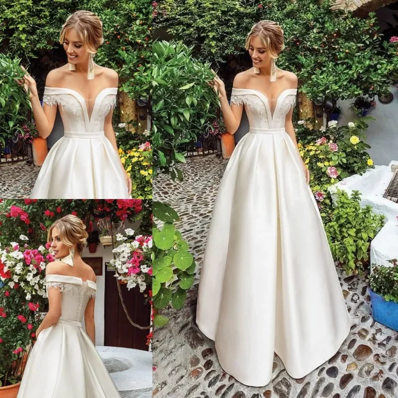 

Luxury Elegant Line A decal off-the-shoulder Wedding dress Sheer low neckline off-the-shoulder sweeping train robe bridal dress