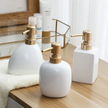 white ceramic soap dispenser