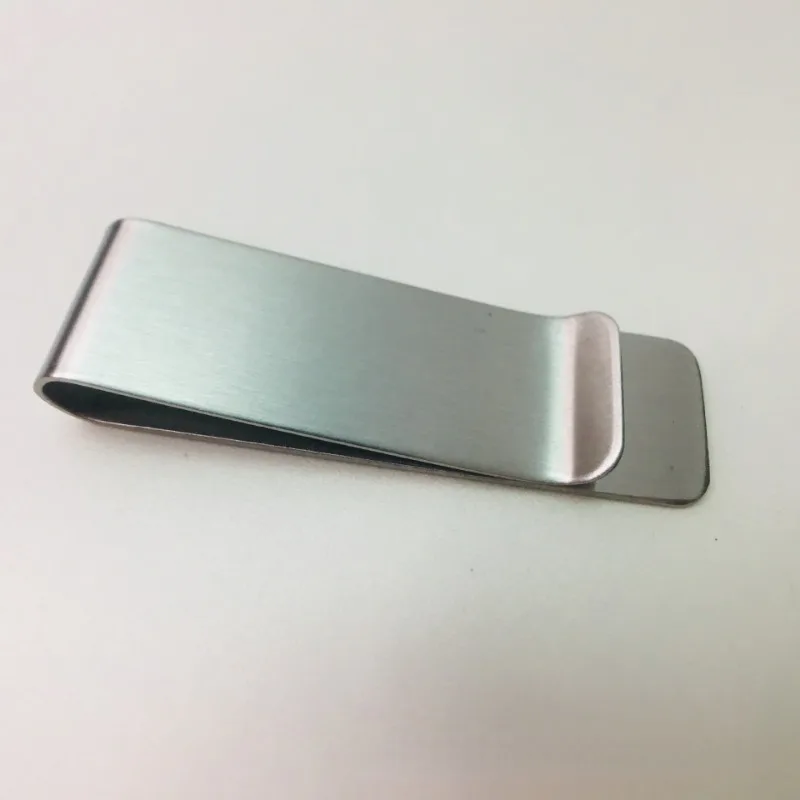 Money Clip Holding Tickets