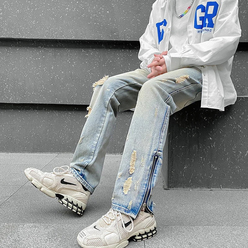 

2022 men's high street hip-hop trend jeans fit straight European and American holes zipper tide brand retro pants brand pants