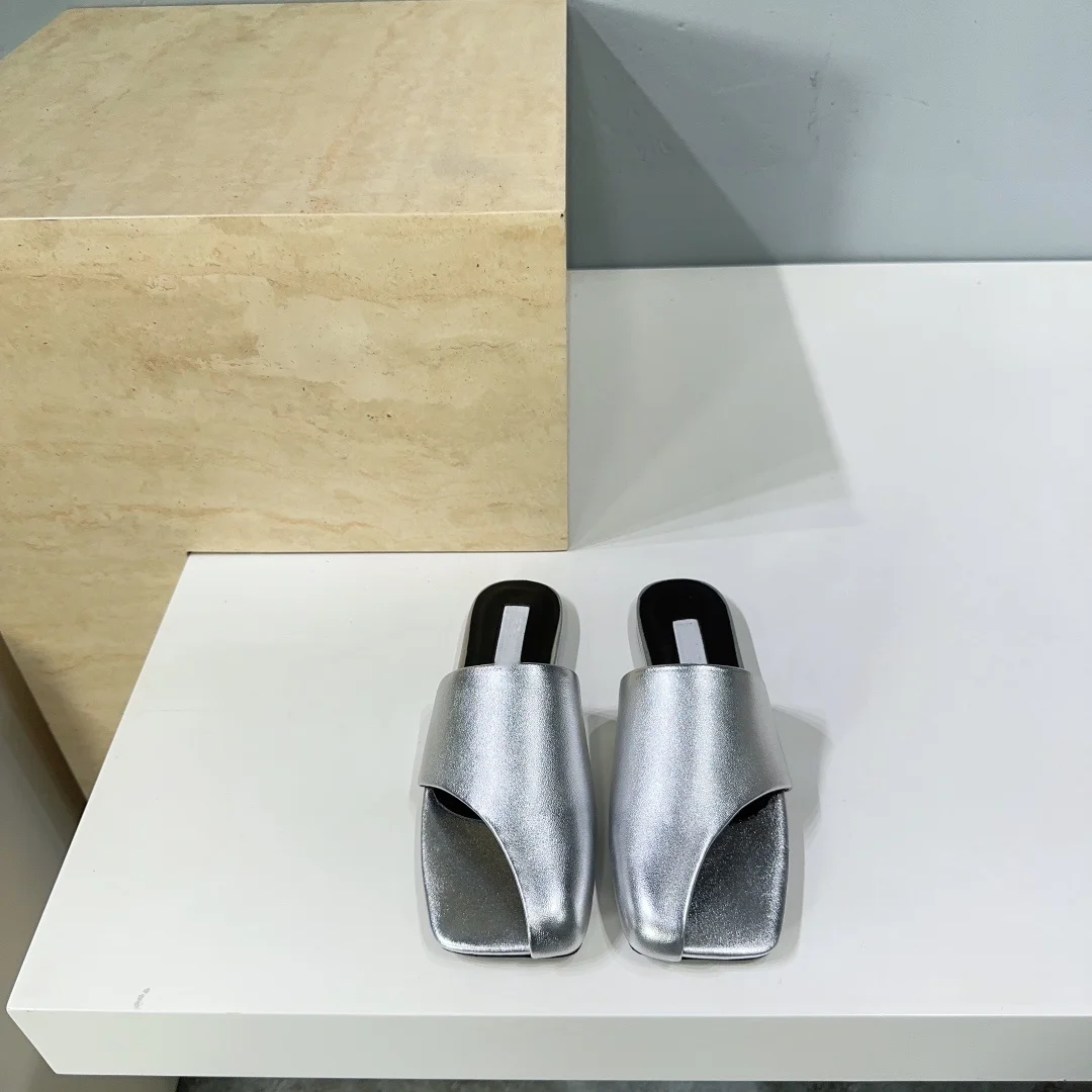 Women's shoes summer new minimalist style leather square head half pack side air fashionable slope heel flat bottom slippers