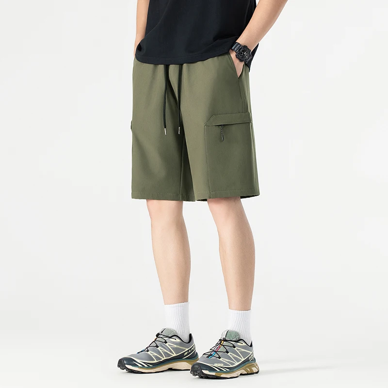 Fashion Elastic Lace Up Solid Color Pockets Casual Shorts Men's Clothing 2024 Summer Loose Korean Straight High Waist Shorts