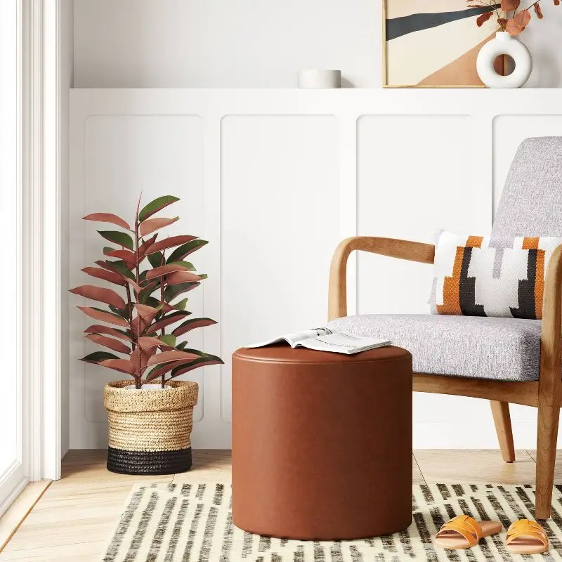 

Classic Round Upholstered Ottoman in Caramel Faux Leather