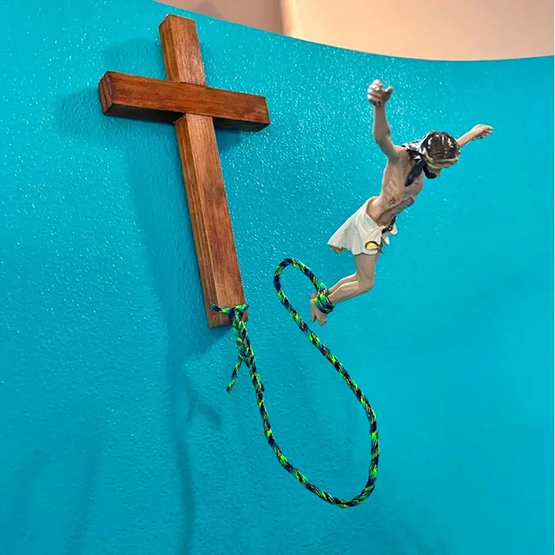 CreativeBungeeJumpingJesusStatueArtJesusExtricateFromTheCross