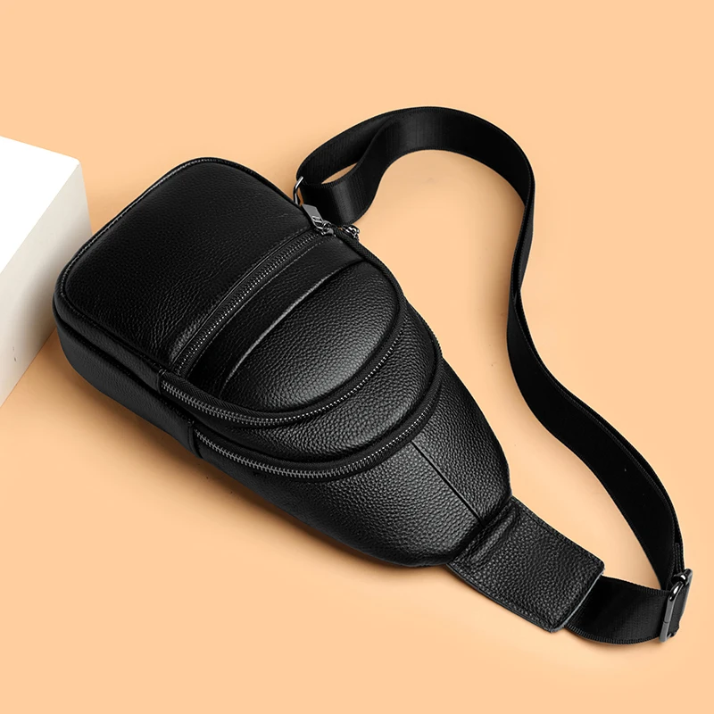 Stylish genuine leather sling bag for men with multiple compartments, ideal for everyday carry or travel