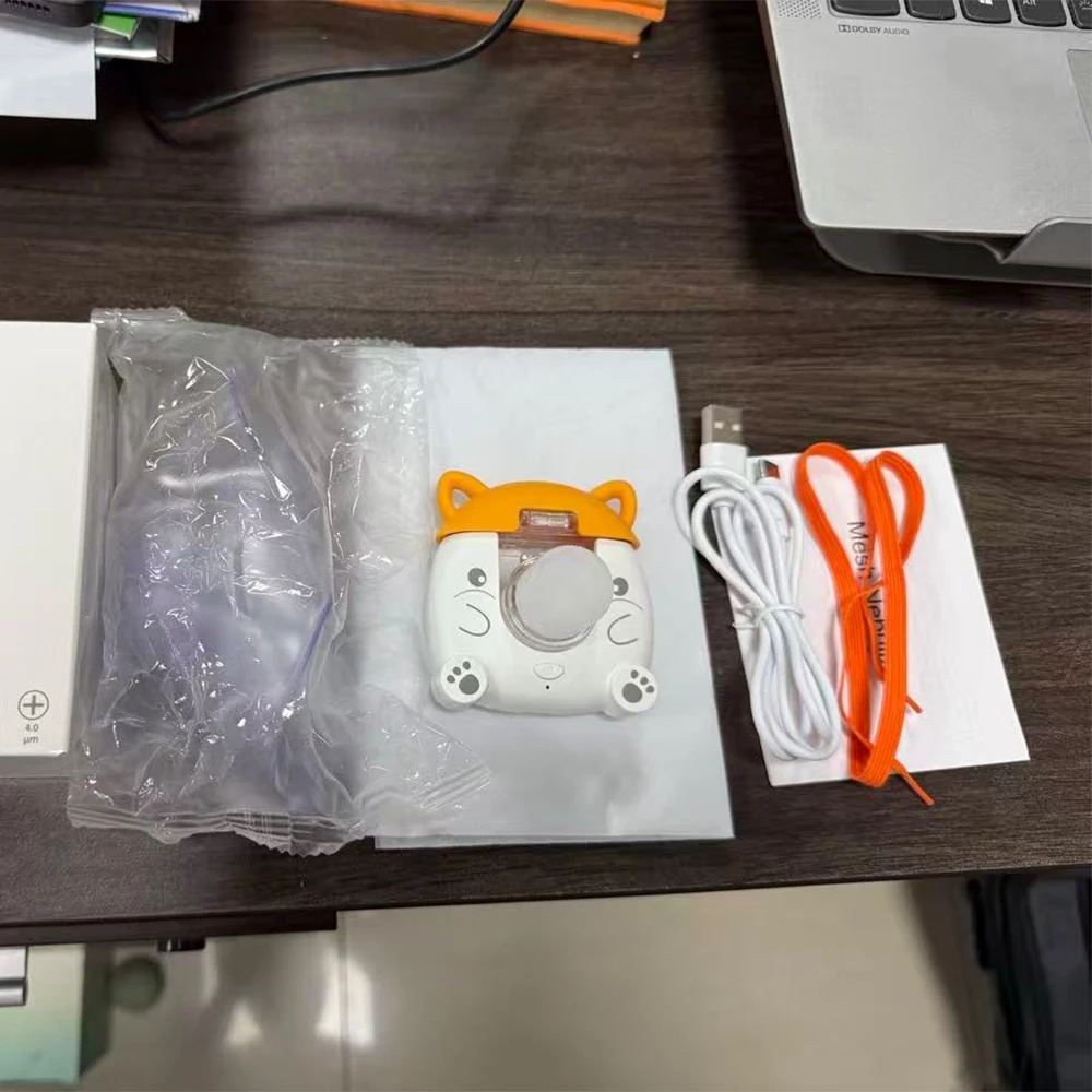 Portable inhale nebulizer shown from front view