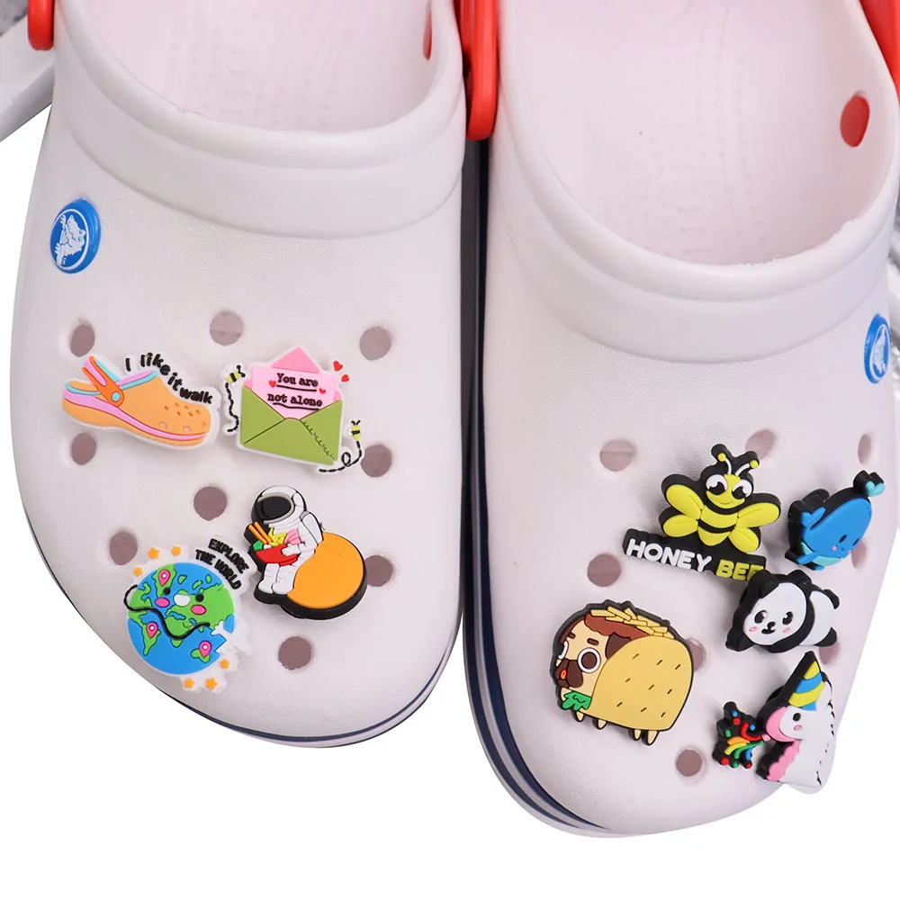 

Mix 50pcs PVC Cartoon Whale Honey Hot Dog Horse Panda Astronaut Walk You Are Not Alone Croc Charms Sandals Shoes Decoration