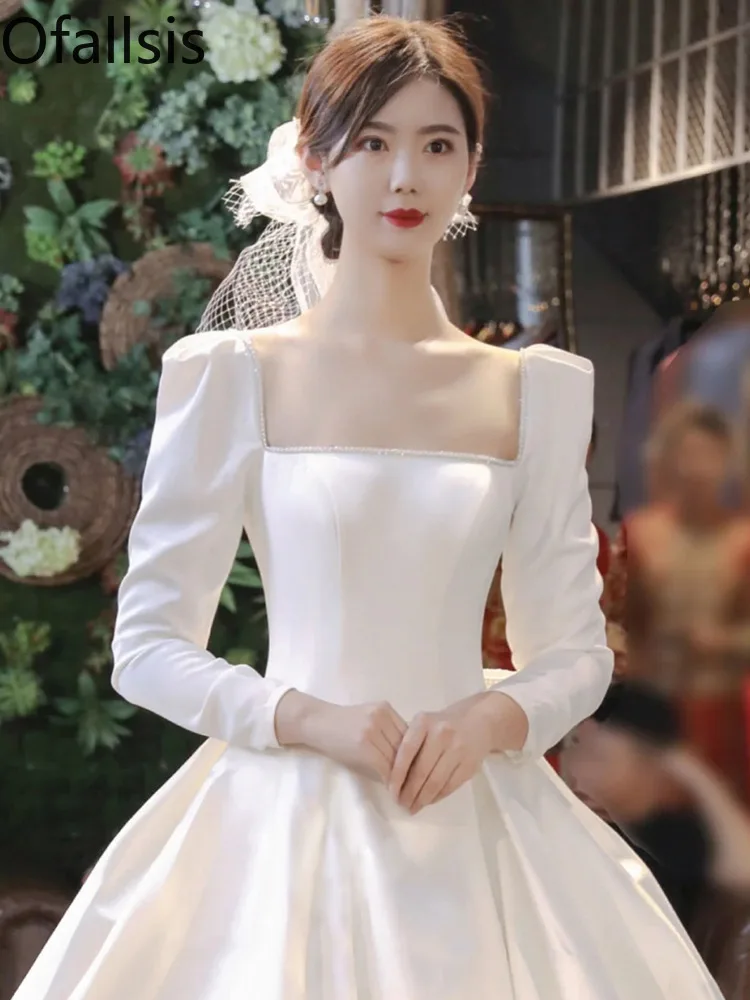 

Ofallsis White Square Neck Light Wedding Dress French Satin Bride 2024 Retro Long Sleeved Main Yarn High End Simple Tail Dresses