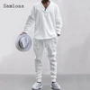 Mens Casual Knitting Two Piece Sets 2023 New Winter Fashion Irregular Top Sweater and Solid White Sweatpants Male Tracksuits Set 1