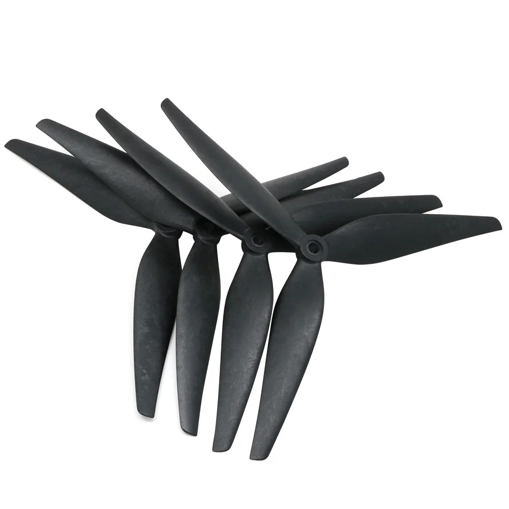 Lot de 4 hélices HQProp pour drone, deux paires de 9x5x3 et 10x5x3, prêtes à être montées.
